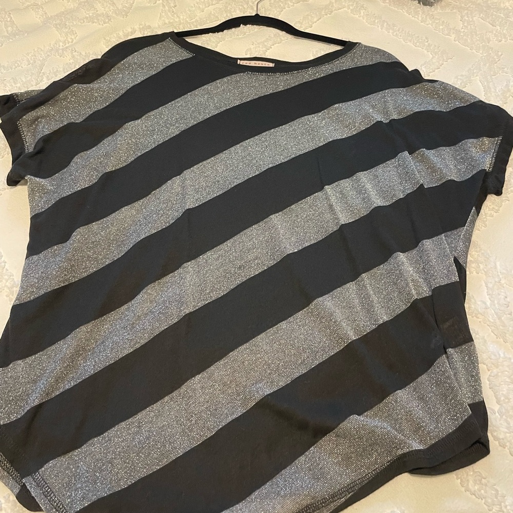 Red Haute medium black and silver shirt.
